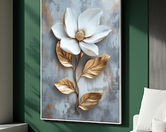 May include: A framed wall art piece featuring a large, white, three-dimensional flower with a golden center and golden leaves. The background is a textured gray with gold accents. The artwork is displayed on a green wall.