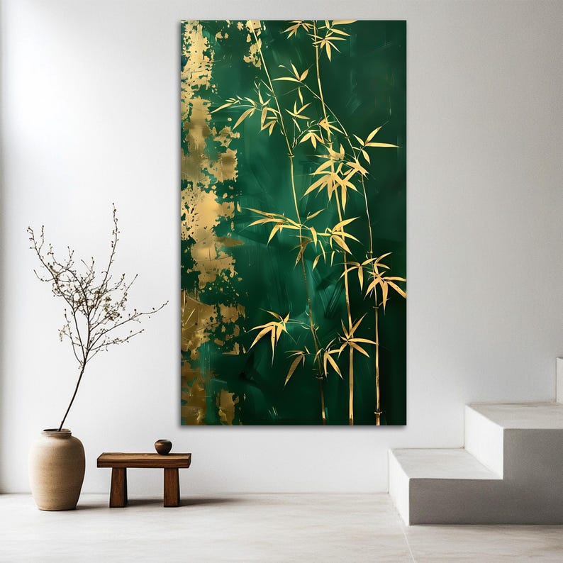 May include: A vertical canvas art piece featuring a dark green background with gold leaf accents. Gold bamboo stalks and leaves are painted on the right side. The artwork is displayed in a modern, minimalist interior.