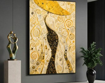 May include: A large rectangular wall art print featuring a stylised figure in a wide-brimmed hat and a flowing gown, rendered in shades of gold, black, and cream with intricate swirling patterns and geometric shapes throughout the composition.