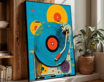 Puede incluir: Una impresión artística enmarcada que presenta una ilustración estilizada de un tocadiscos vintage con un disco de vinilo azul. La obra de arte tiene una estética retro con acentos amarillos y naranjas brillantes sobre un fondo azul.