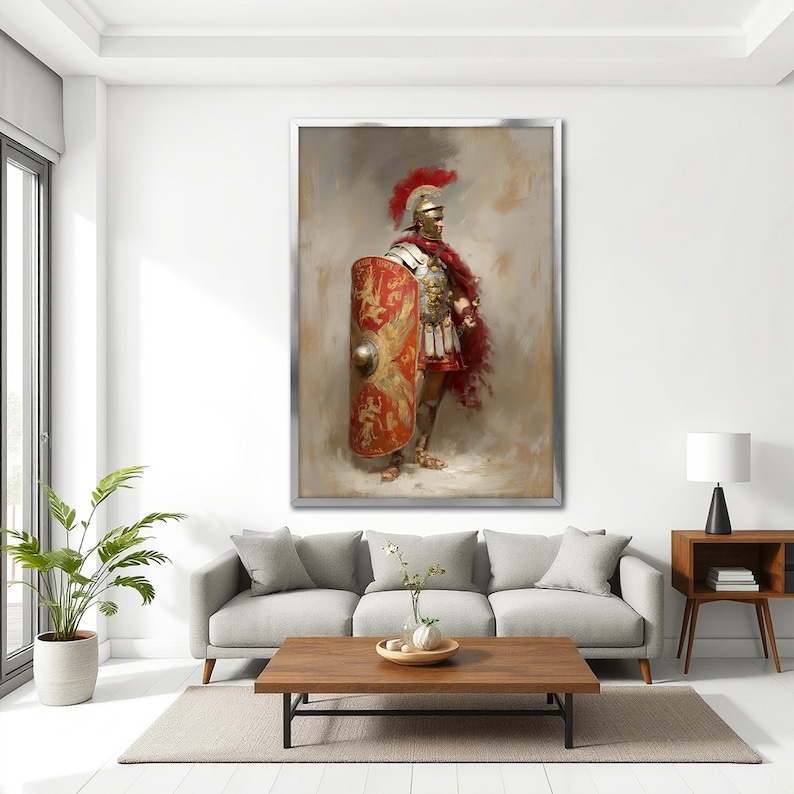 May include: A framed artwork depicting a Roman soldier in full armor. The painting features a red and gold shield, a red cape, and a helmet with a red plume. The soldier is standing in a neutral pose against a muted background.