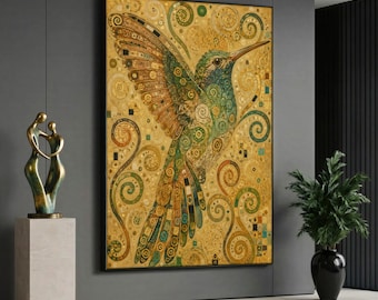 May include: A rectangular wall art print featuring a stylized hummingbird in flight, rendered in shades of gold, green, and brown with intricate swirling patterns and geometric shapes against a textured, metallic-toned background.