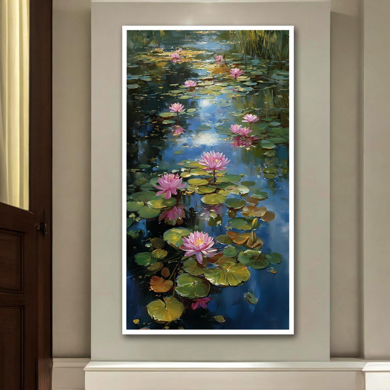 May include: A vertical painting of a pond with pink water lilies and green lily pads. The water reflects the sky, creating a blue and white shimmering effect. The artwork is framed in a white border.