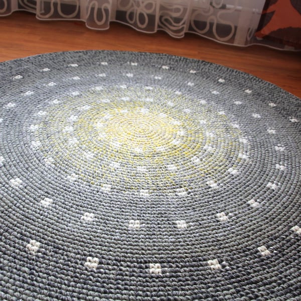 Cute spotted round rug, hand crocheted from a quality wool, 50 to 65 inches in diameter
