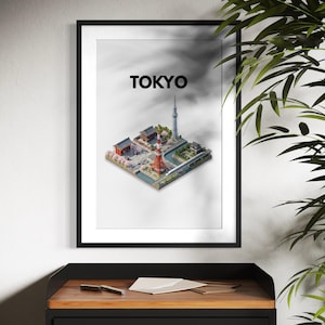 May include: Framed art print featuring a detailed 3D model of Tokyo, including the Tokyo Tower and other landmarks. The word "TOKYO" is printed in bold, black letters at the top. The print is displayed on a wooden surface.