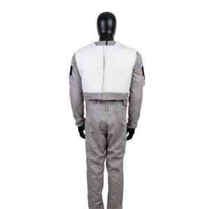 May include: A full-body costume set featuring a light gray long-sleeved shirt and matching trousers. A white vest with a gray bottom border is worn over the shirt. The outfit is displayed on a black mannequin, showing the back view of the ensemble.