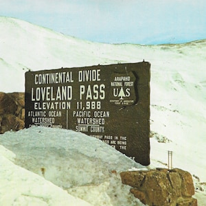 Forest Service Sign at summit of Loveland Pass - Between Silverplume & Dillon, Colorado - Vintage Postcard