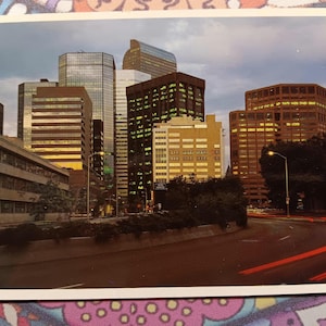 Downtown Denver at Dusk - Vintage Postcard