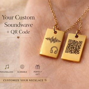 May include: A gold-coloured necklace with two rectangular pendants. One pendant features a soundwave design and headphones, the other a QR code. The text "Your Custom Soundwave + QR Code" is visible. The necklace is a personalised gift.