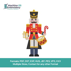 May include: A digital embroidery design of a traditional nutcracker soldier. The design features a red coat, black hat, and blue pants. The nutcracker holds a gift, a drum, and a candy cane. The image includes the text "Machine ES Embroidery" and "Precision Matters".