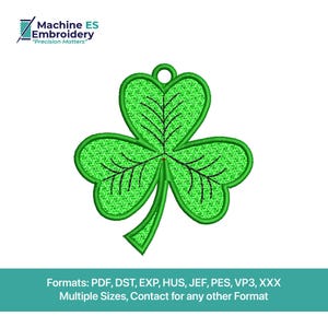 May include: A green shamrock embroidery design with a textured fill and black vein details. The design includes a loop at the top for hanging. The image also includes the text "Machine ES Embroidery" and "Precision Matters".