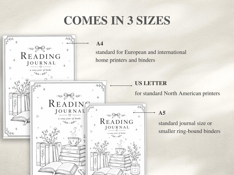 Three black and white Reading Journals in A4, US Letter, and A5 sizes. The journals have a floral and book design with the text "Reading Journal" and "a cozy year of books".