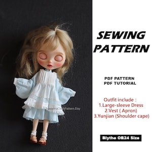 May include: A doll with blonde hair wearing a light blue dress with long sleeves, a white vest, and a shoulder cape. Text reads: SEWING PATTERN, PDF PATTERN, PDF TUTORIAL, Outfit include: 1.Large-sleeve Dress 2.Vest (Apron) 3.Yunjian (Shoulder cape), Blythe OB24 Size.