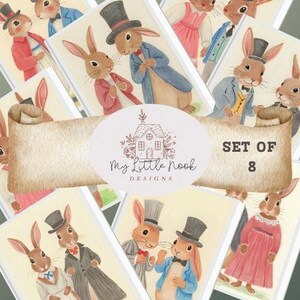 May include: Set of 8 illustrated cards featuring anthropomorphic rabbits in vintage clothing. The cards have a cream background and are decorated with a scroll and the text "My Little Nook Designs". The cards are in a variety of colors.