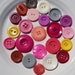 see more listings in the Boutons section