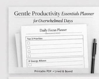 May include: A white planner with the text "Gentle Productivity Essentials Planner for Overwhelmed Days" and "Daily Focus Planner." The planner includes sections for "Top 3 Priorities" and "If Energy Allows." A black pen rests beside the planner. The planner is a Printable PDF, Lined & Boxed.
