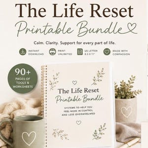 May include: A spiral-bound planner titled The Life Reset Printable Bundle with 90+ pages of tools and worksheets. The cover features botanical illustrations, hearts, and the text: Systems to help you feel more in control and less overwhelmed. 21.6 x 27.9 cm.