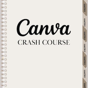 May include: A spiral-bound notebook with a beige cover featuring the title "Canva CRASH COURSE" in black script. The notebook has chapter tabs and the text "FOR FREE & PRO USERS" at the bottom.