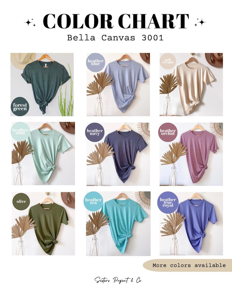 K&ouml;nnte beinhalten: Farbkarte mit Bella Canvas 3001 T-Shirts in verschiedenen Farben, darunter Waldgr&uuml;n, Heather Blue und Olive. Jedes Shirt wird auf einem Kleiderb&uuml;gel mit Knotendetail pr&auml;sentiert. Der Text "More colors available" ist ebenfalls vorhanden.