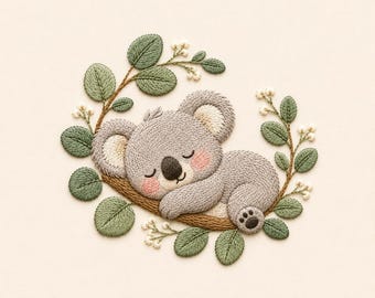 May include: An embroidery design featuring a sleeping gray koala with pink cheeks resting on a brown branch. The koala is surrounded by a circular arrangement of green eucalyptus leaves and small white flower buds on a light cream fabric background.