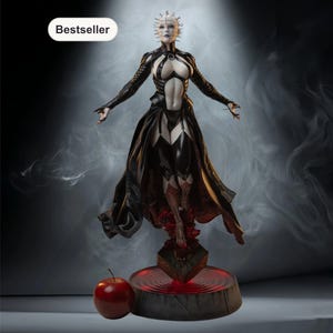 May include: A detailed figurine of a character with pale skin, a spiked headpiece, and a black outfit. The figure is standing on a base with a red glowing effect, and a red apple is placed nearby. The word "Bestseller" is in the top left corner.