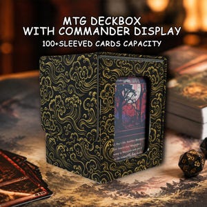 May include: A black deck box with a gold cloud and wave pattern, featuring a front display window for a card. Text reads: MTG DECKBOX WITH COMMANDER DISPLAY 100+SLEEVED CARDS CAPACITY. The box is designed to hold trading cards securely.