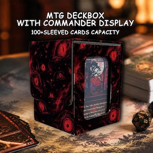 May include: A black and red MTG deckbox with a commander display window and a capacity for 100+ sleeved cards. The exterior features a dark, swirling pattern with multiple red eyes. Text on the image reads: MTG DECKBOX WITH COMMANDER DISPLAY 100+SLEEVED CARDS CAPACITY.
