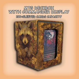 May include: MTG deck box featuring a raccoon design and floral patterns. It includes a commander display and holds over 100 sleeved cards. Text on the box reads "MTG DECKBOX WITH COMMANDER DISPLAY 100+SLEEVED CARDS CAPACITY."