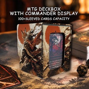 May include: A rectangular MTG deckbox with a commander display window, featuring a printed illustration of a fox warrior in front of a large red sun. The text reads MTG DECKBOX WITH COMMANDER DISPLAY and 100+SLEEVED CARDS CAPACITY. The box has a textured finish.