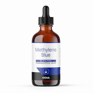 May include: A brown glass dropper bottle containing Methylene Blue 5% solution, pharmaceutical grade. The white label features blue text, a circular logo with a flask icon, and the volume 100ML printed in white on a black horizontal band.
