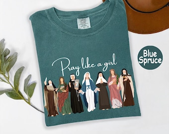 Comfort Colors® Catholic Saint T-Shirt, Pray Like A Girl Christian Shirt, Gift for Women, Faith Inspired Shirt, Cute Faith Marian Shirt