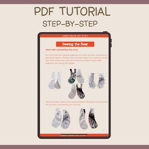 May include: A digital PDF tutorial displayed on a tablet screen. The tutorial, titled "Sewing the Bear," provides step-by-step instructions with diagrams for assembling bear arms. The screen displays text and images of fabric pieces.
