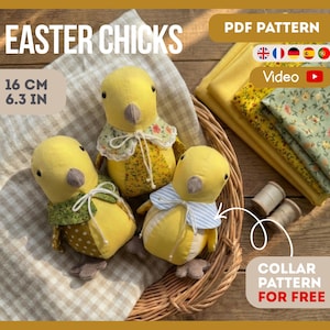 May include: Three handmade yellow Easter chick plush toys with decorative collars, each approximately 16 cm (6.3 inches) tall, are displayed in a woven basket. The image includes text that reads "Easter Chicks" and "PDF Pattern".