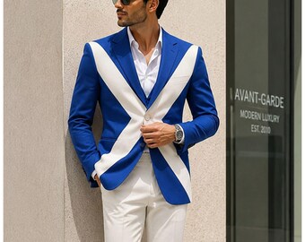 May include: A royal blue blazer featuring a prominent white X-shaped pattern across the front, worn over a crisp white button-down shirt and light-colored trousers. The blazer has a single-button closure and long sleeves with a structured lapel design.