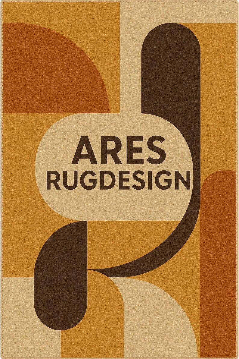 May include: Geometric rug design in shades of brown, tan, and orange. The rug features a pattern of curved shapes and rectangular blocks. The text "ARES RUGDESIGN" is displayed in a beige oval shape in the center of the rug.