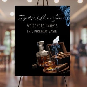 May include: Black sign with the text "Tonight, We Raise a Glass." and "Welcome to Harry's Epic Birthday Bash!" A decanter, a glass of whiskey with ice, cigars, and a cigar box are featured.