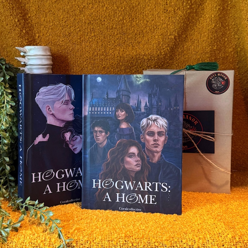 May include: Two hardcover books titled "Hogwarts: A Home" with character illustrations. The book covers feature portraits of young people in dark clothing. A package tied with twine and a green tassel is to the right.