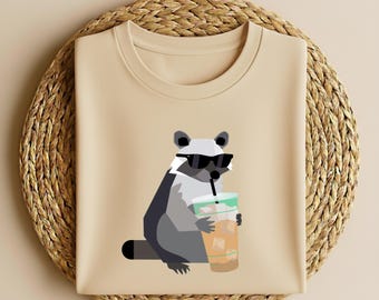 Funny Raccoon Drinking Iced Coffee Shirt, Animal Meme Graphic Tee, Gift for Men, Women