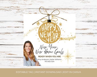 May include: A white and gold New Year's greeting card with a woman's photo. The card features a gold ornament with "Happy New Year" text, "New Year, New Home Goals" text, and a starburst design. The bottom text says "Editable Tag | Instant Download | Edit in Canva."