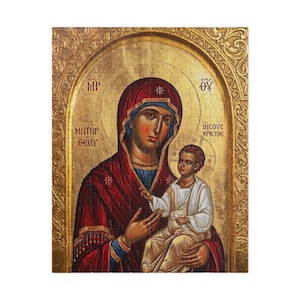 Peut inclure: Un puzzle représentant une icône religieuse de la Vierge Marie en robe rouge foncé tenant l'enfant Jésus vêtu de blanc. Le fond est doré avec un cadre en arc et du texte grec incluant MP, ΘV, MHTHP ΘEOY et IHCOYC XPICTOC.