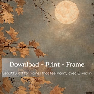 Puede incluir: Una impresi&oacute;n de arte digital que muestra una luna llena en un cielo oscuro detr&aacute;s de hojas de arce oto&ntilde;ales en tonos naranja y marr&oacute;n. La imagen incluye el texto en blanco: Download - Print - Frame. Beautiful art for homes that feel warm, loved & lived in.