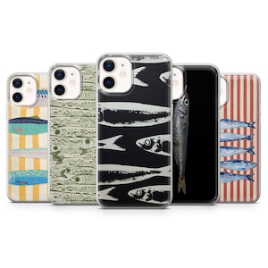 May include: A collection of phone cases with fish-themed designs. The cases feature various patterns, including striped, illustrated, and photographic images of fish. The color palette includes blue, yellow, green, black, and white.