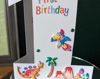 A5 Size 1 Shaped First Birthday Card Decorated With Dinosaurs