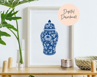 Puede incluir: Un jarrón de jengibre de porcelana azul y blanco con diseños florales. El jarrón está sentado en un estante de madera con una vela y una cesta tejida.