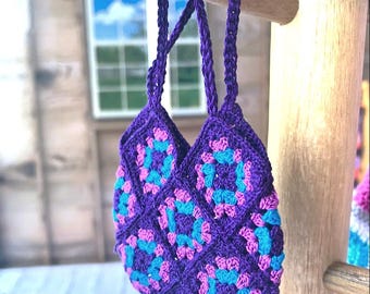 Hand-crocheted small purple granny square bag made for dolls