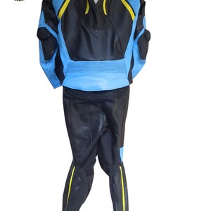 May include: Black and blue motorcycle racing suit with yellow accents. The suit features a leather jacket and pants. The jacket has blue panels on the shoulders and sides, with yellow stripes. The pants have yellow stripes down the sides.