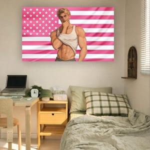 May include: A digital art print featuring a muscular figure in a white tank top, set against a pink and white American flag design. The artwork is displayed on a wall above a bed and desk.