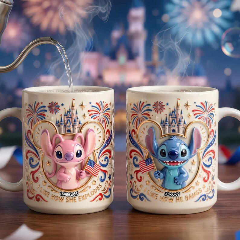 May include: Two cream-colored ceramic mugs featuring embossed 3D characters. The left mug shows a pink character with the text 'ISABELLE' and 'I LIKE HOW SHE EXPLODES'. The right mug shows a blue character with 'JOHNNY' and 'I LIKE HOW HE BANGS'.