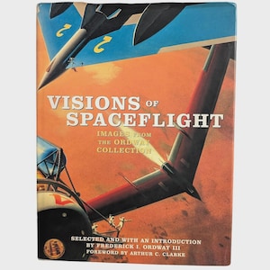 May include: A hardcover book titled Visions of Spaceflight: Images from the Ordway Collection. The cover features a vibrant illustration of a blue and red spacecraft against an orange sky, with text detailing the collection and authors.