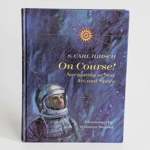 May include: A hardback book titled On Course! Navigating in Sea, Air, and Space by S. Carl Hirsch, illustrated by William Steinel. The cover features a blue celestial map background with a central star and an astronaut in a white helmet.